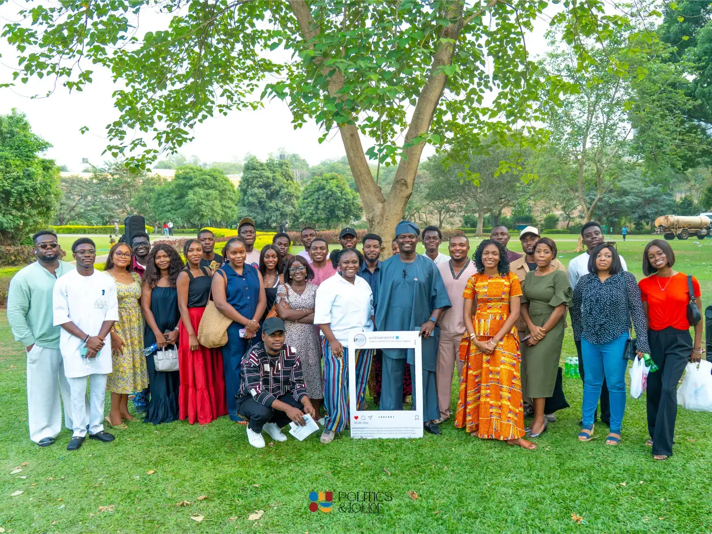 The Politics & Jollof community gathered outdoors