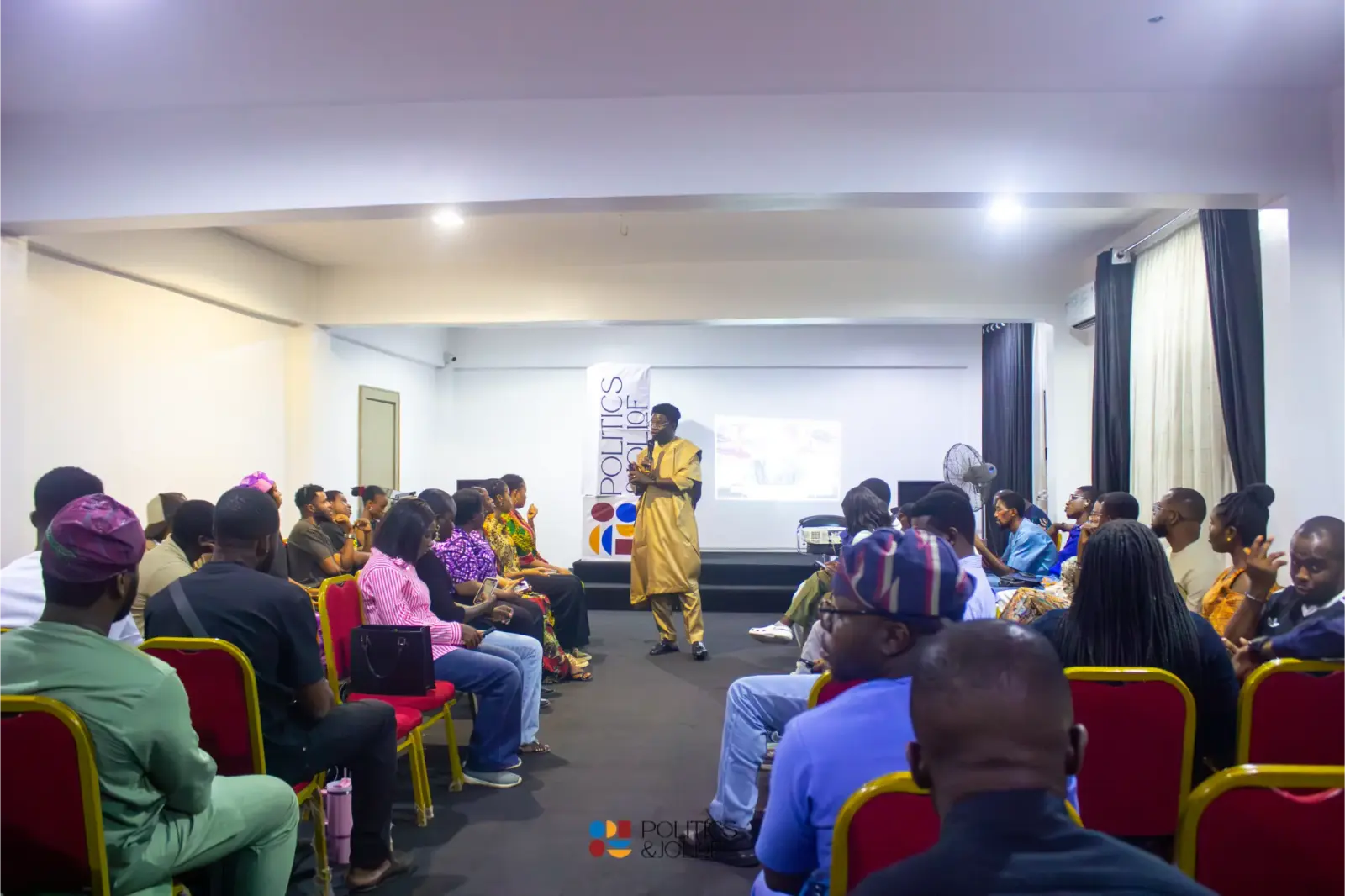 A full room listening during a Politics & Jollof debate